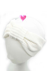 Breites Cordjersey Haarband in Cremeweiß mit weicher Stoffstruktur, vielseitig kombinierbares Accessoire für Damen und natürliche Alltagslooks.