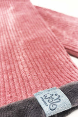 Detail von rosa Cord Stulpen