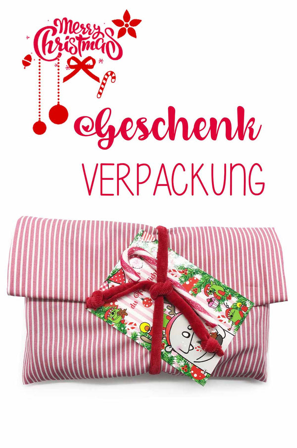 Geschenkverpackung rosa gestreift stoffbeutel mit zuckerstange und weihnachtskarte 