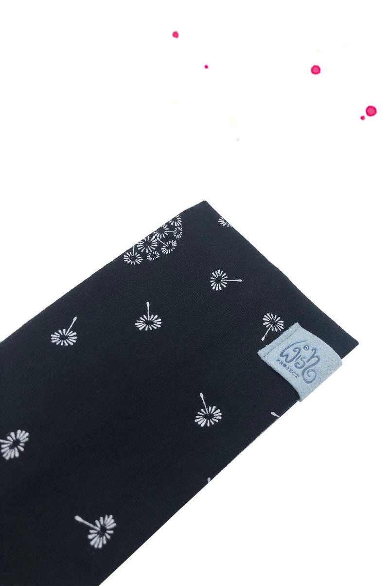 stirnband schwarz mit pusteblumen motiv weiß detail mit recyceltem label